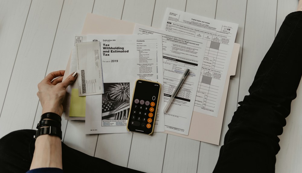 Calculator and financial documents for tax preparation