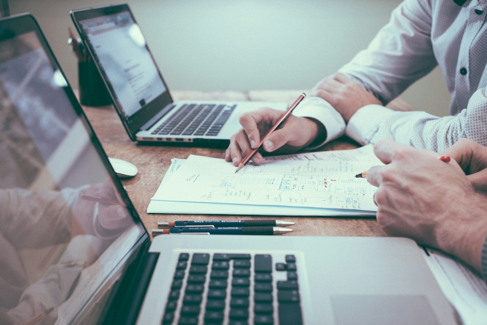 Professionals reviewing business documents together